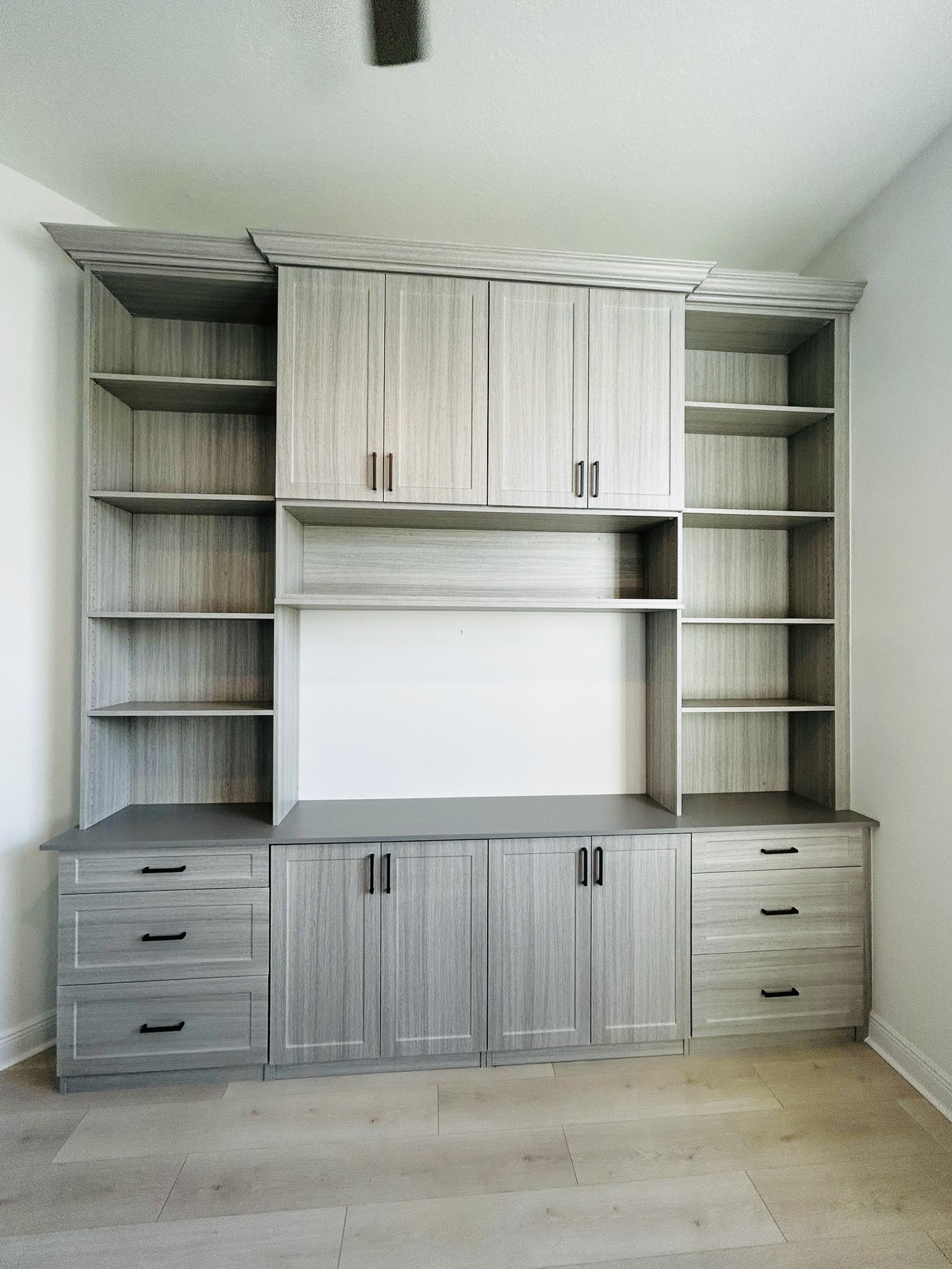 Luxury custom walk-in closet with full organizer system by Dream Closets LLC in Sarasota FL